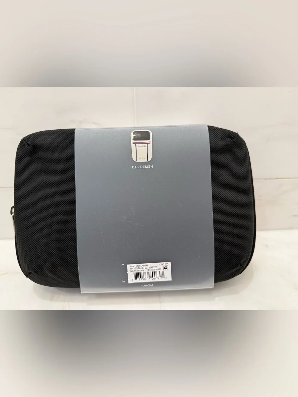 Tumi up sale